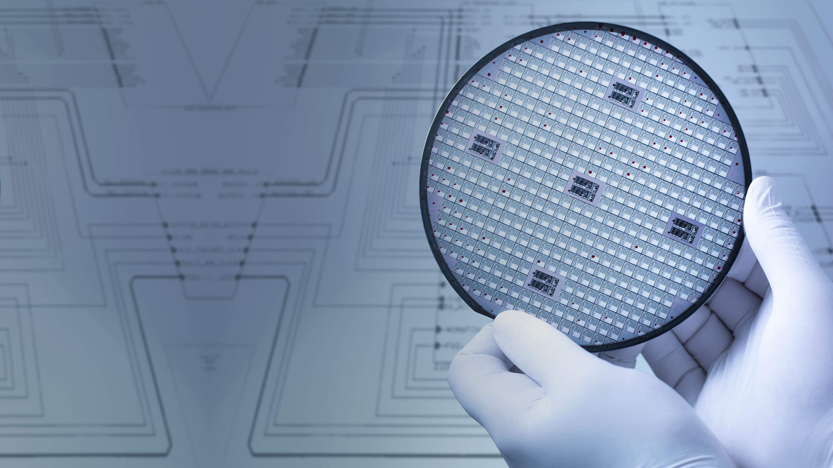 Close-up of personnel conducting close examination of a semiconductor product