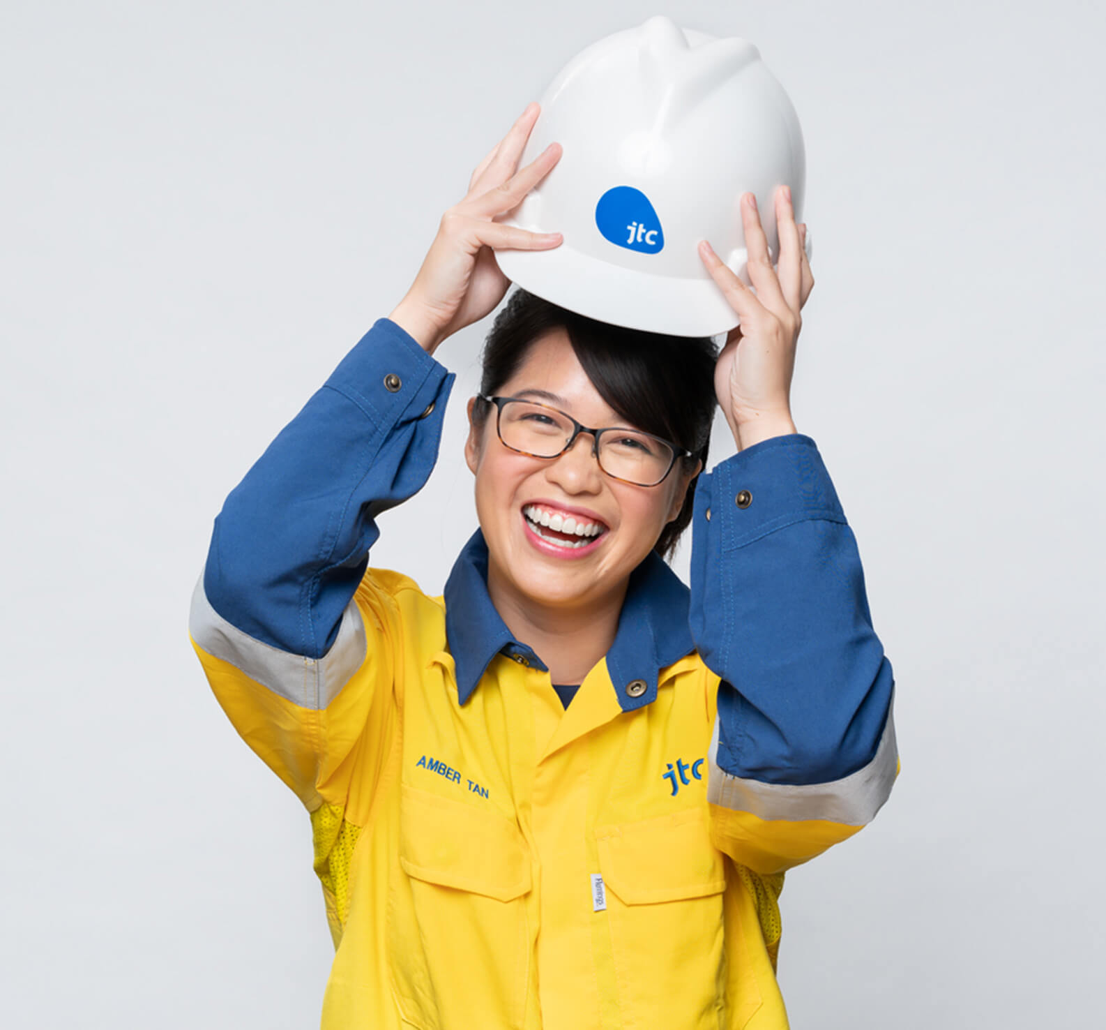 An employee in a hard hat 