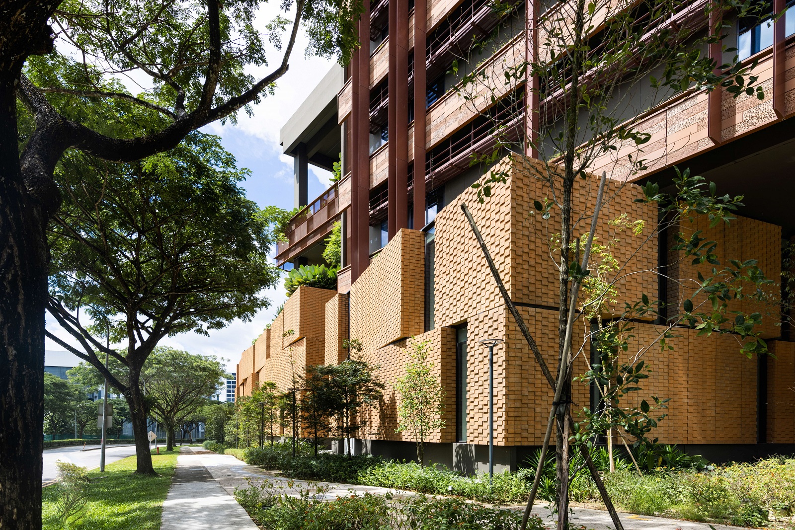 The facade at JTC CleanTech Three features textured walls that break the monotony with varying angles